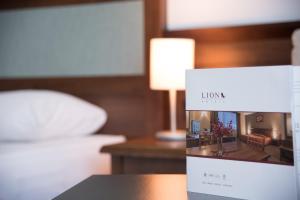 Ένα ή περισσότερα κρεβάτια σε δωμάτιο στο Lion Sunny Beach Hotel