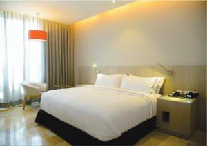 Katil atau katil-katil dalam bilik di GHL Hotel Monteria