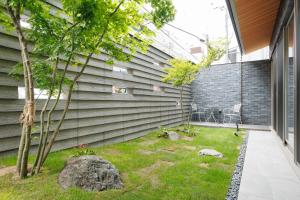 A garden outside Gion Elite Terrace