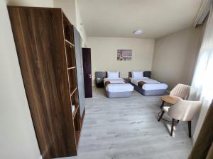 Кровать или кровати в номере The Saj Hotel