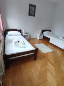 Cama ou camas em um quarto em Villa Kuna