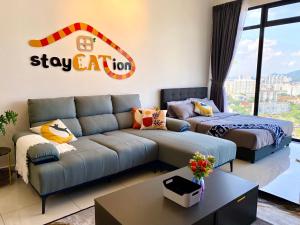 אזור ישיבה ב-Beacon Executive Suite by stayCATion Homestay