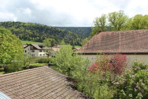 a view from the roof of a house at A CÔTE in Môtiers