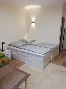 Una cama o camas en una habitación de Wohnung im Erdgeschoss