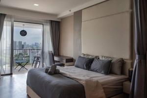 Ένα ή περισσότερα κρεβάτια σε δωμάτιο στο Deluxe Seaview Suite King Bed by The Only Bnb