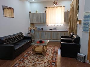 Un lugar para sentarse en Islamabad Comfort Home