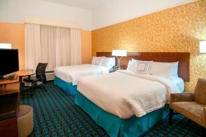 Postelja oz. postelje v sobi nastanitve Fairfield Inn & Suites by Marriott San Antonio Brooks City Base