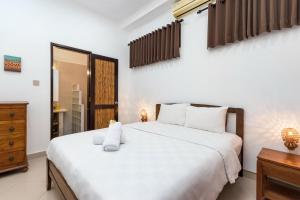 Фотография из галереи GLOBALSTAY. 2 Bedroom Villa Casa Yenny with Private Pool Near Seminyak Beach в Семиньяк