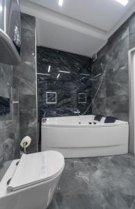 Un baño de Luxury Apartments Arena Guliver