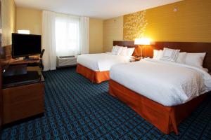 Кровать или кровати в номере Fairfield Inn & Suites by Marriott Wentzville