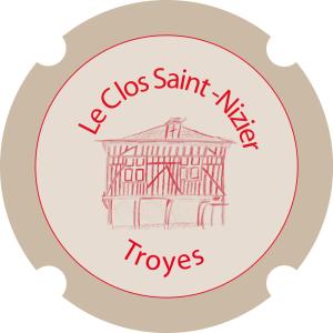 a drawing of the colosseum and the words tosc santiago at Le Clos Saint Nizier in Troyes