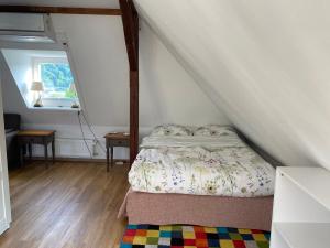 Una cama o camas en una habitación de Wohlfühlen in Bad Ems