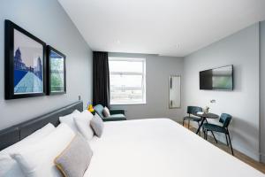 เตียงในห้องที่ Staycity Aparthotels London Greenwich High Road