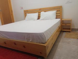 Cama ou camas em um quarto em Travelodge Homestay