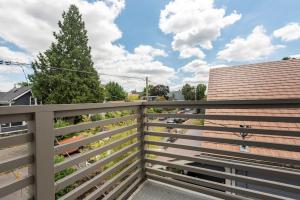 A balcony or terrace at Comfy Family Home, Walkable Neighborhood + Patio!