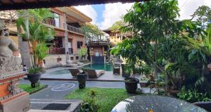 Vrt pred nastanitvijo Kun - Kun Guest House Ubud