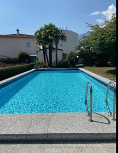 Kolam renang di atau dekat dengan Camera privata con balcone giardino e piscina