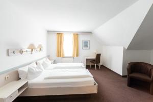 Tempat tidur dalam kamar di Sonnenhotel Hoher Hahn