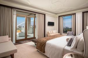 Voodi või voodid majutusasutuse The St. Regis Astana toas