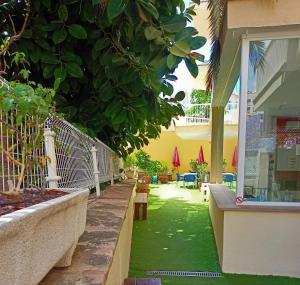 A garden outside Palma Port Hostel - Albergue Juvenil