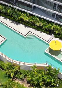 Kolam renang di atau di dekat Three B Airlie 2 bedroom unit Seaviews & Pool