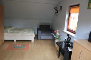 Una cama o camas en una habitación de Podelniska