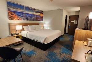 Tempat tidur dalam kamar di Days Inn by Wyndham Tucumcari