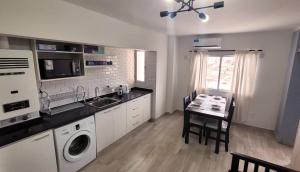 Dapur atau dapur kecil di Nice Full Apartment Downtown Salta