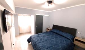 Tempat tidur dalam kamar di Nice Full Apartment Downtown Salta