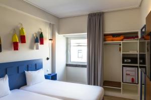 Voodi või voodid majutusasutuse Ibis Styles Lisboa Centro Liberdade NE toas