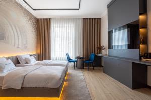 Krevet ili kreveti u jedinici u okviru objekta Villa Boutique Hotel