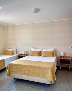 Cama ou camas em um quarto em Enjoy Viana - Guest House