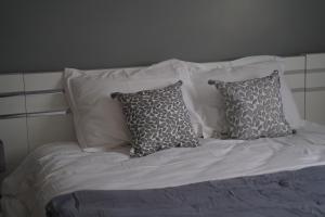 A bed or beds in a room at Villa Fontenailles