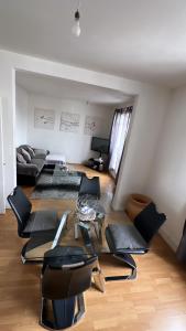 O zonă de relaxare la Appartement 60 m², porte de Saint-Cloud