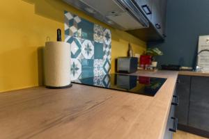 Una cocina o kitchenette en Le Vintage coup de coeur !