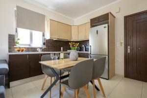 Una cocina o kitchenette en Christini Cozy Apartment