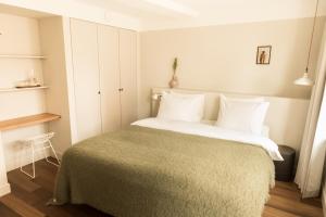 מיטה או מיטות בחדר ב-Boutique Hotel Weesp