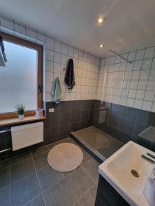 Un baño de Apartment Kurši