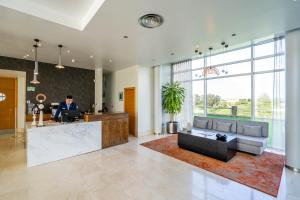 A seating area at Abba Comillas Hotel