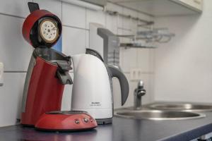 a coffee maker sitting on a counter in a kitchen at Ferienwohnung Schläfer in Kappel-Grafenhausen