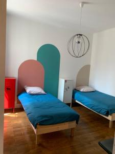 Cama ou camas em um quarto em Appartement T3 Lyon, part Dieu