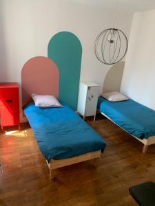 Cama ou camas em um quarto em Appartement T3 Lyon, part Dieu