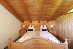 Ліжко або ліжка в номері Schelpenalp Berghotel Balderschwang