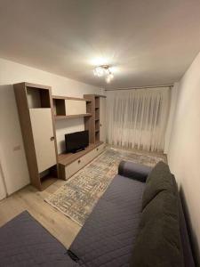 Зона вітальні в Apartament regim hotelier