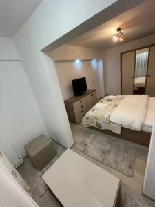 Ліжко або ліжка в номері Apartament regim hotelier