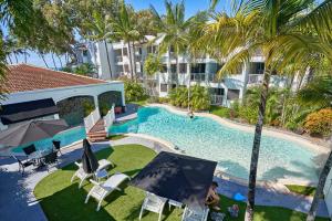 Piscina a Alassio Beachfront Apartments Palm Cove o a prop