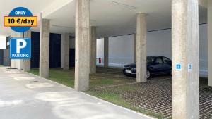 a car parked in a parking lot next to the ocean at Hotel BESTPRICE Alcalá in Madrid