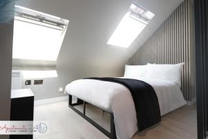 เตียงในห้องที่ Beautiful Studio Apartment - London