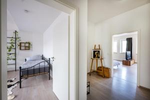 Una cama o camas en una habitación de Altstadtjuwel mit Loft Charme - Netflix