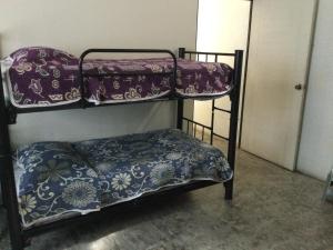 Llit o llits en una habitació de Trotamundo Oaxaca Hostel